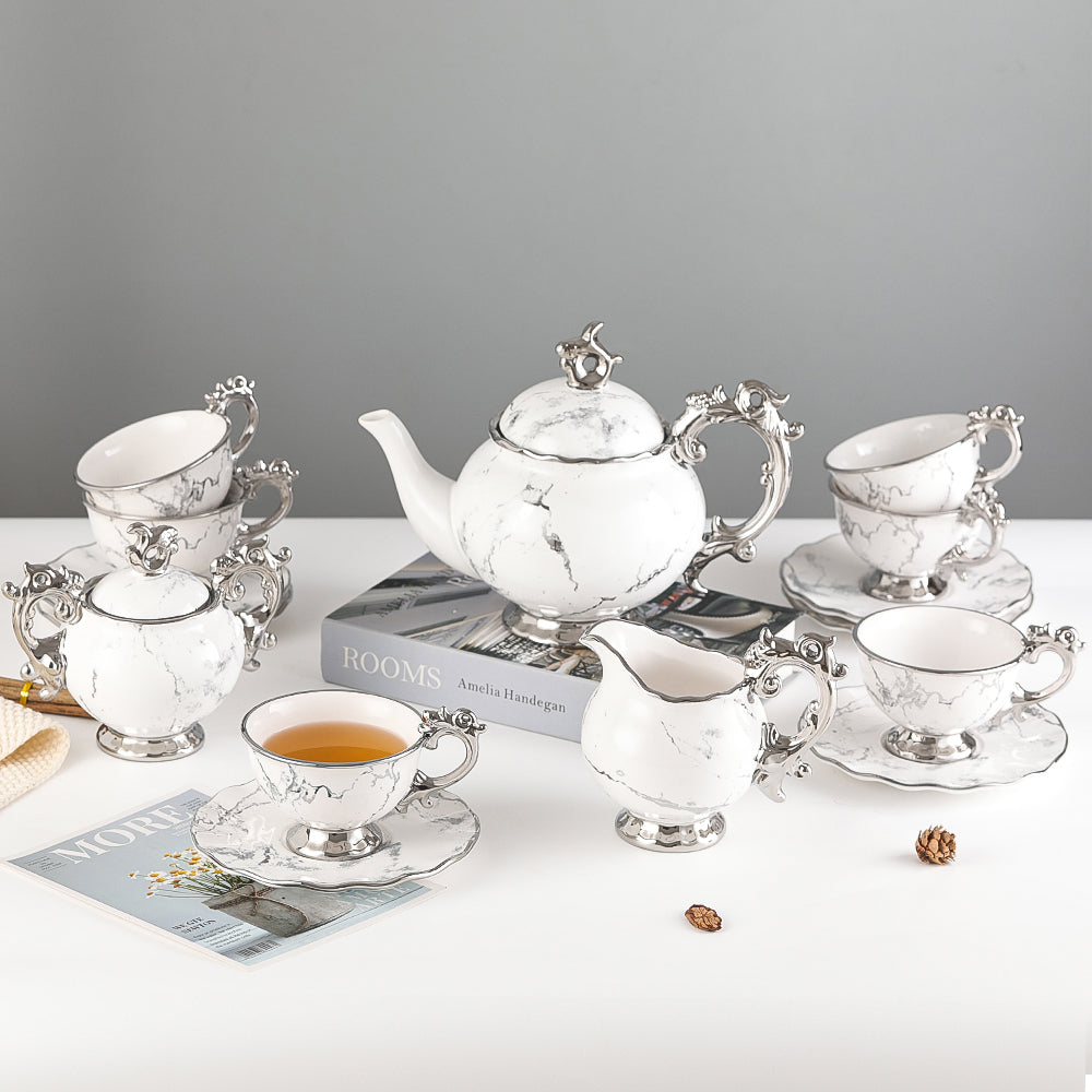 marble tea set with silver trim